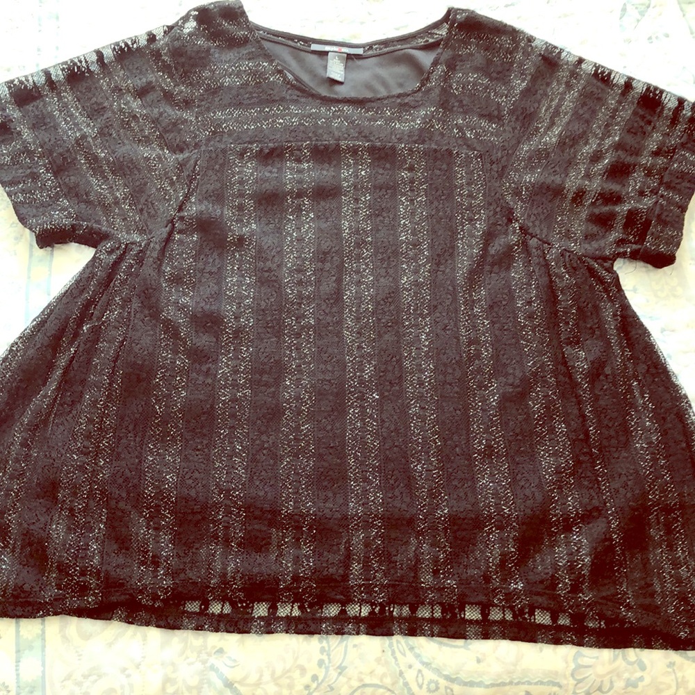 Black shell with silver threading on overlay.